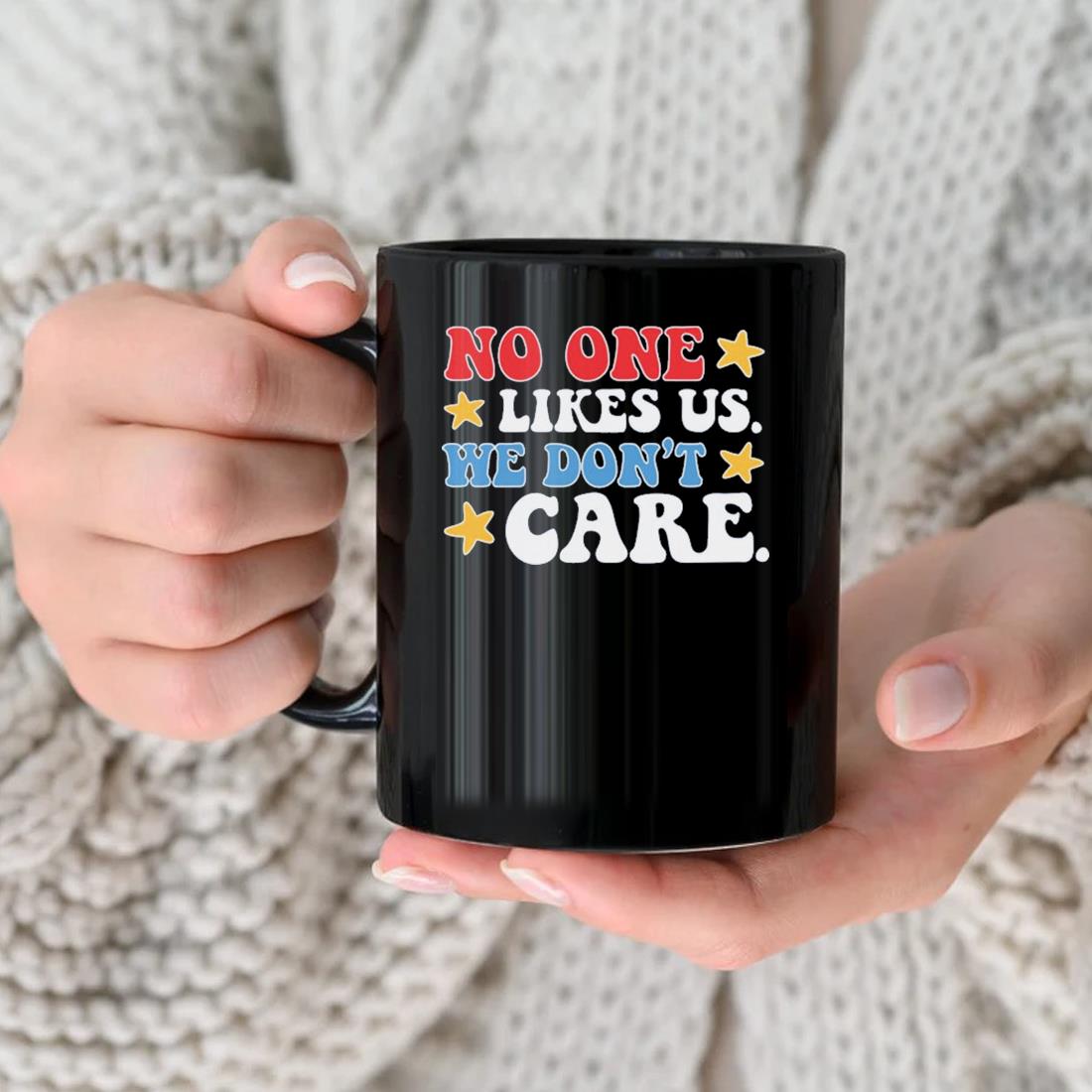 https://images.trendmugus.com/2023/06/no-one-likes-us-we-dont-care-stars-mug-nhu.jpg